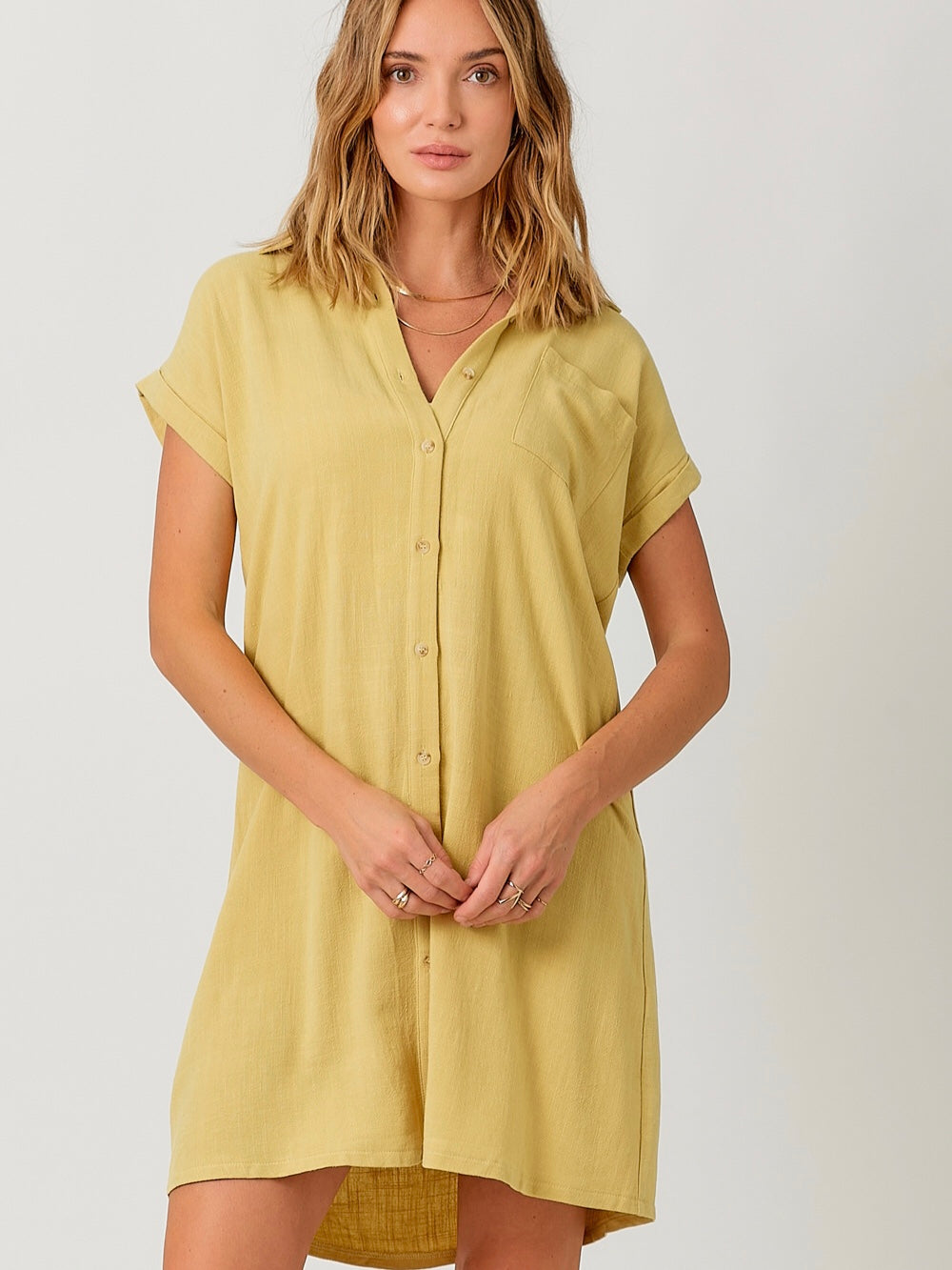 Linen Blend Roll-Up Sleeve Dress
Custard Yellow 
Short sleeves
Button down
Bust pocket
Thigh length
Front View