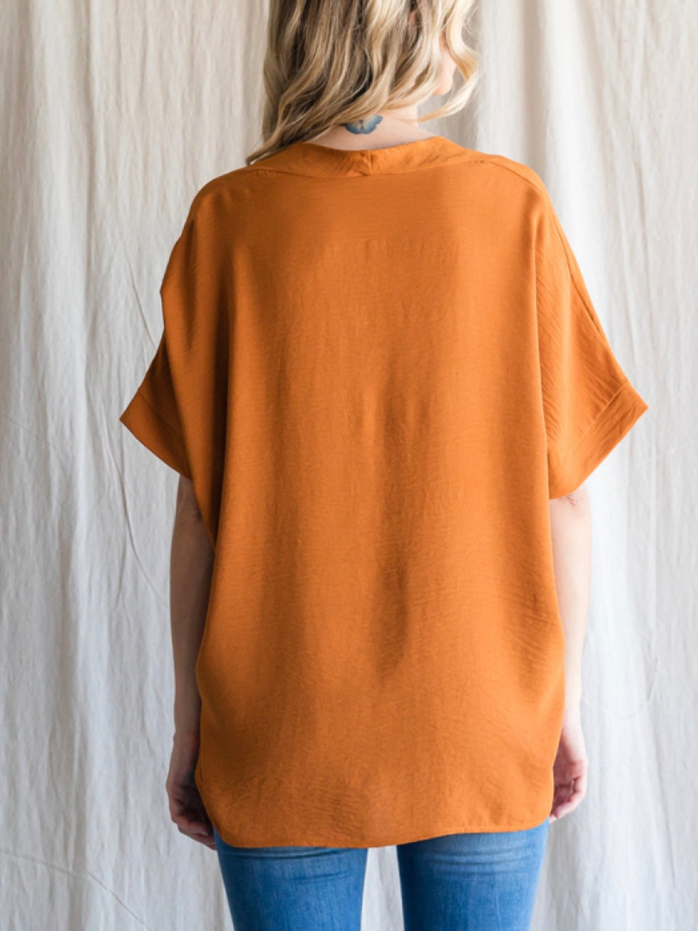 Back view of Jodifl caramel short sleeve boxy top