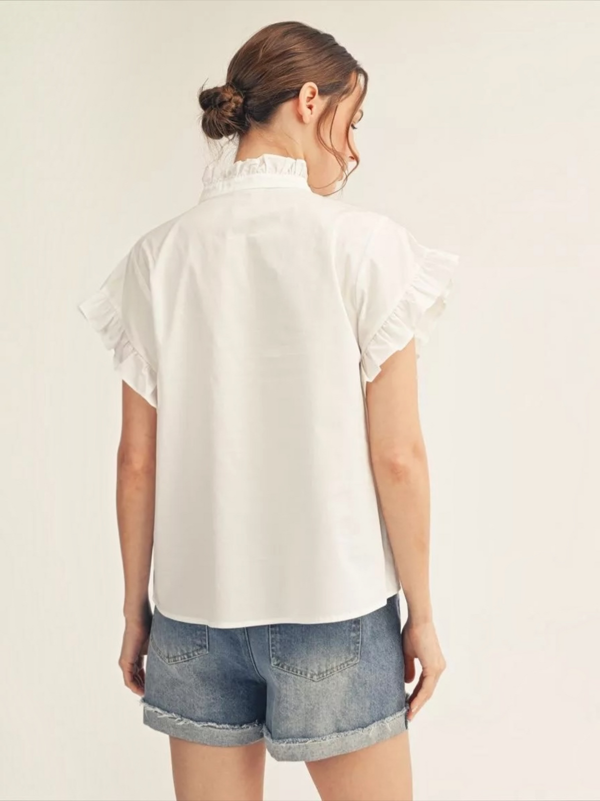 Back view of Jodifl white ruffle collar button-down cotton top